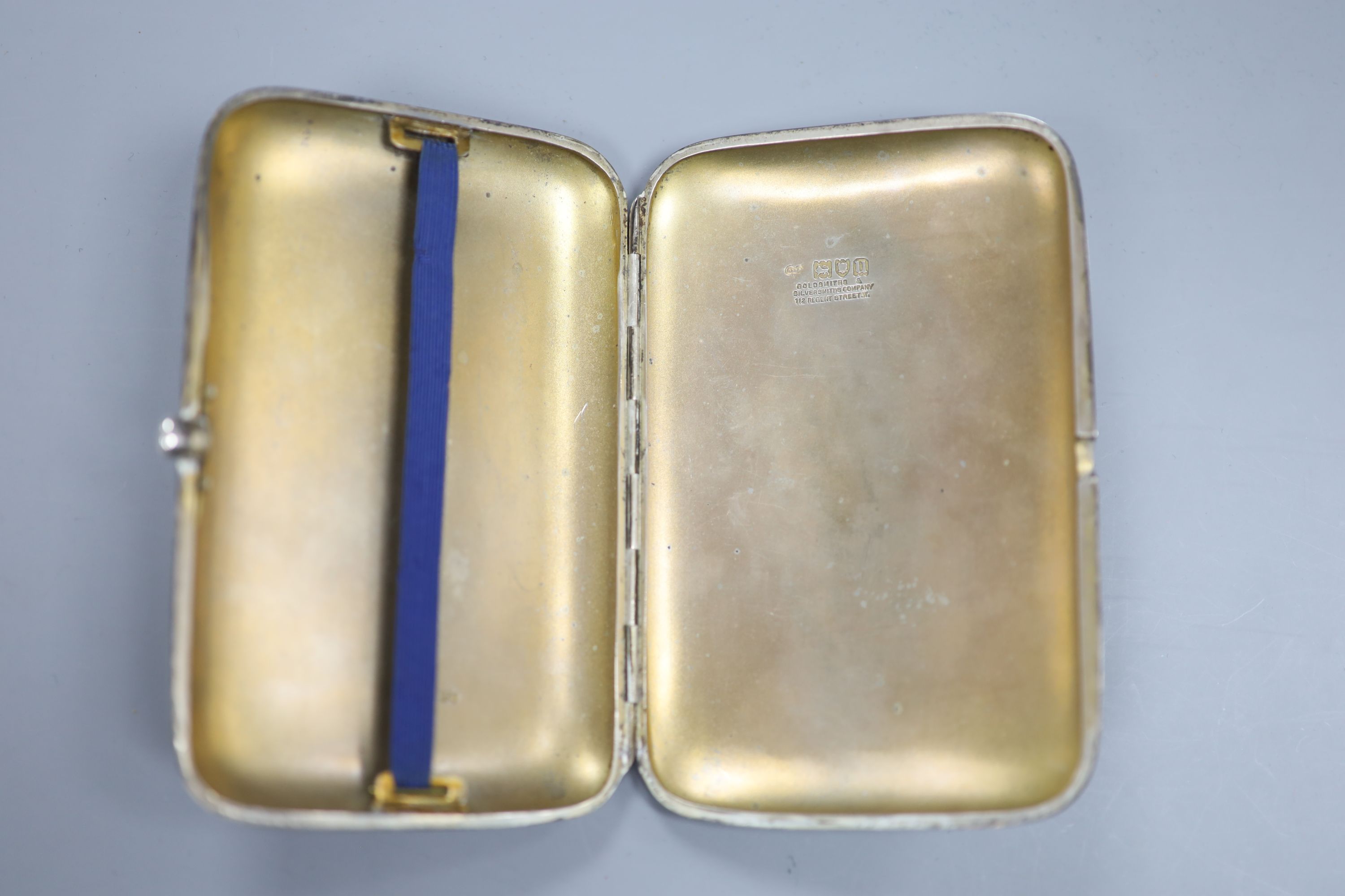 A George V silver cigarette case, Goldsmiths & Silversmiths Co Ltd, London, 1915, 12.8cm, gross 193 grams.